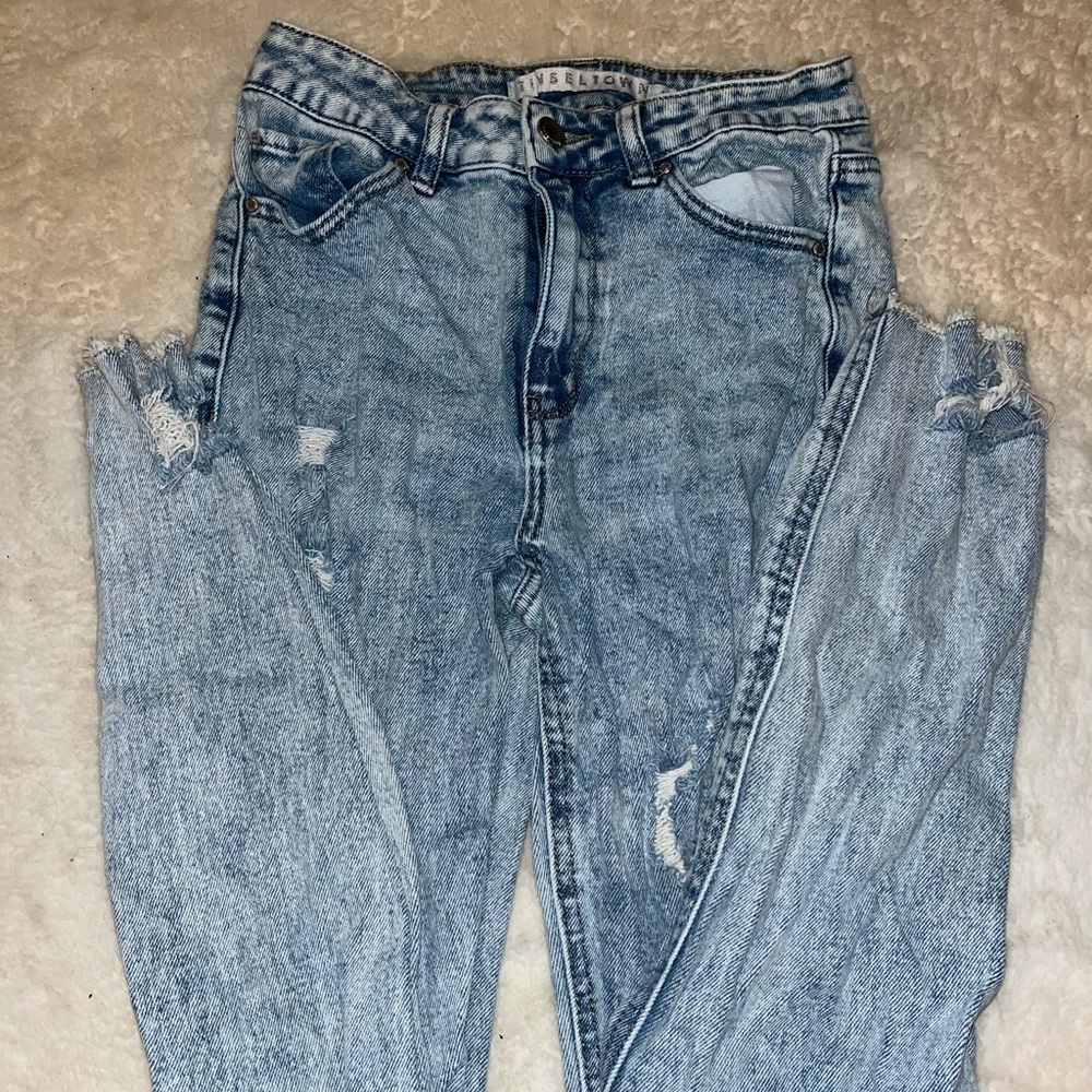 Ripped blue jeans